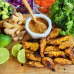 Thai Chicken strips with Almond Butter Sauce and other fresh garnishes
