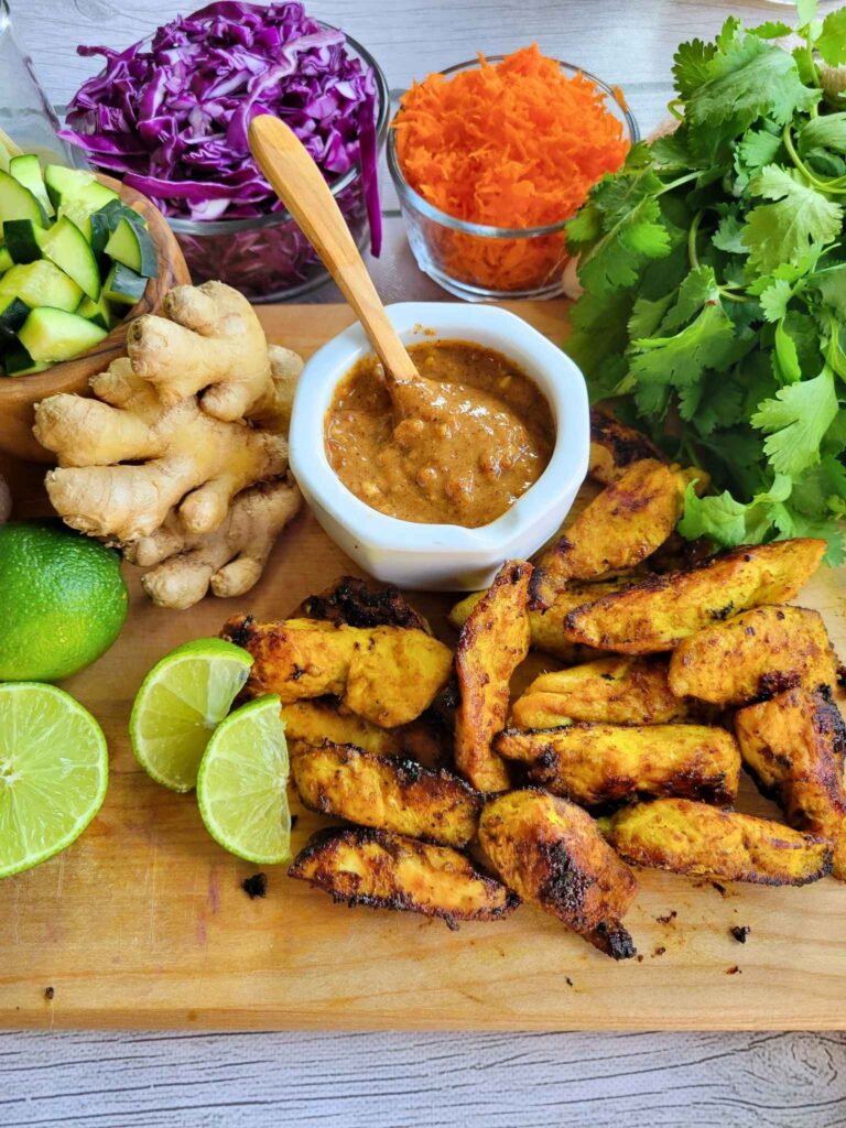 Thai Chicken strips with Almond Butter Sauce and other fresh garnishes